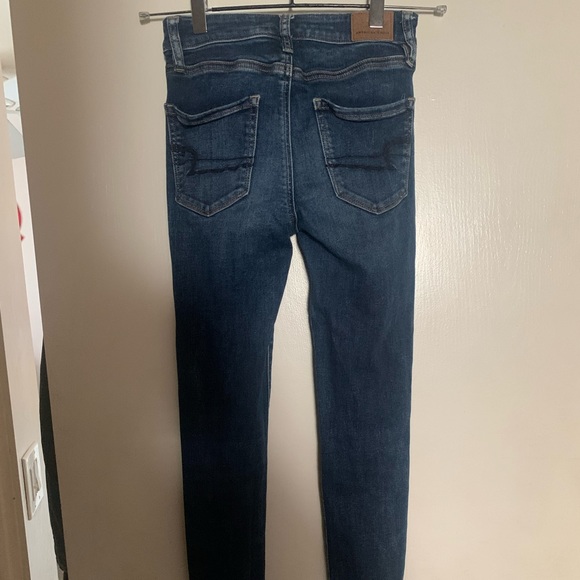EUC AE skinny blue jeans with distressed knees. Size 00 - Picture 4 of 5